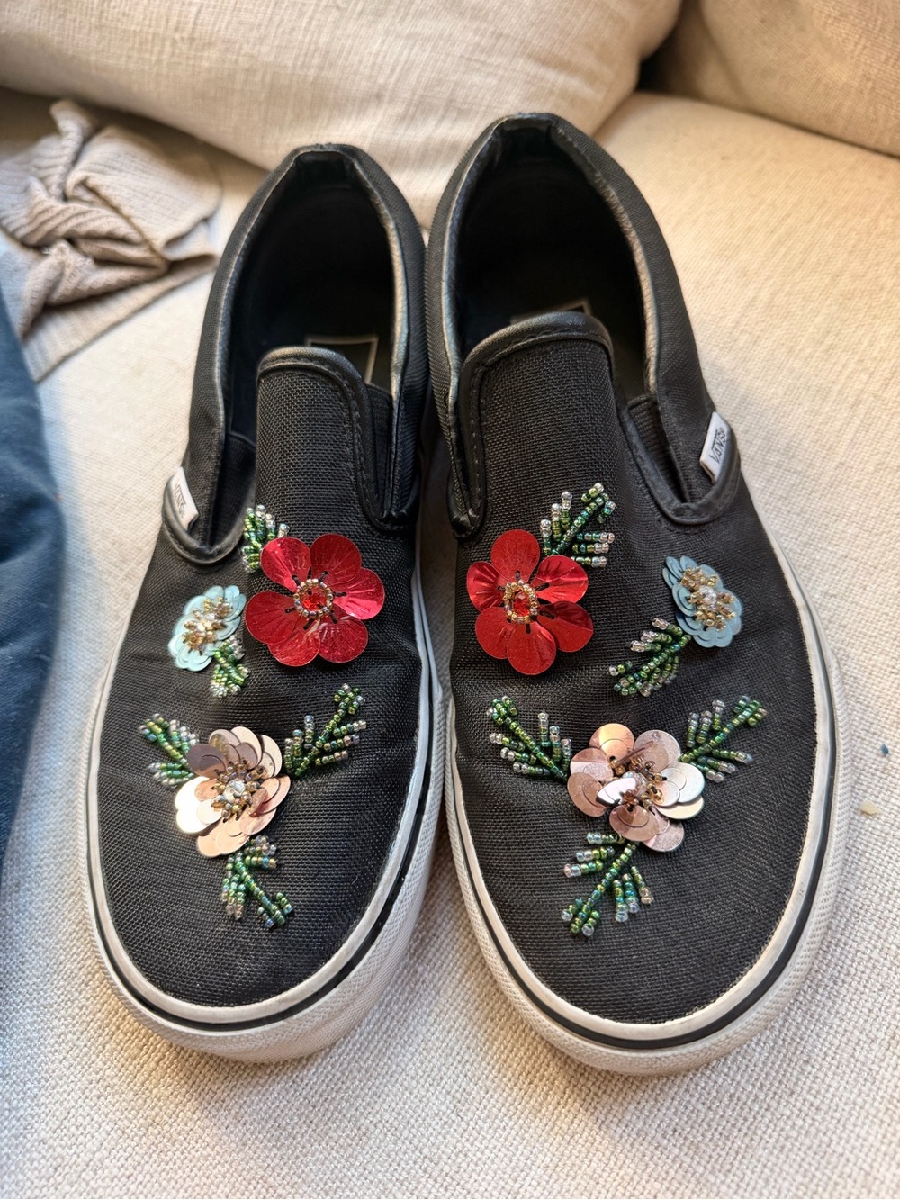 Vans Black Slip-On Sneakers with Red and Pink Floral Embellishments